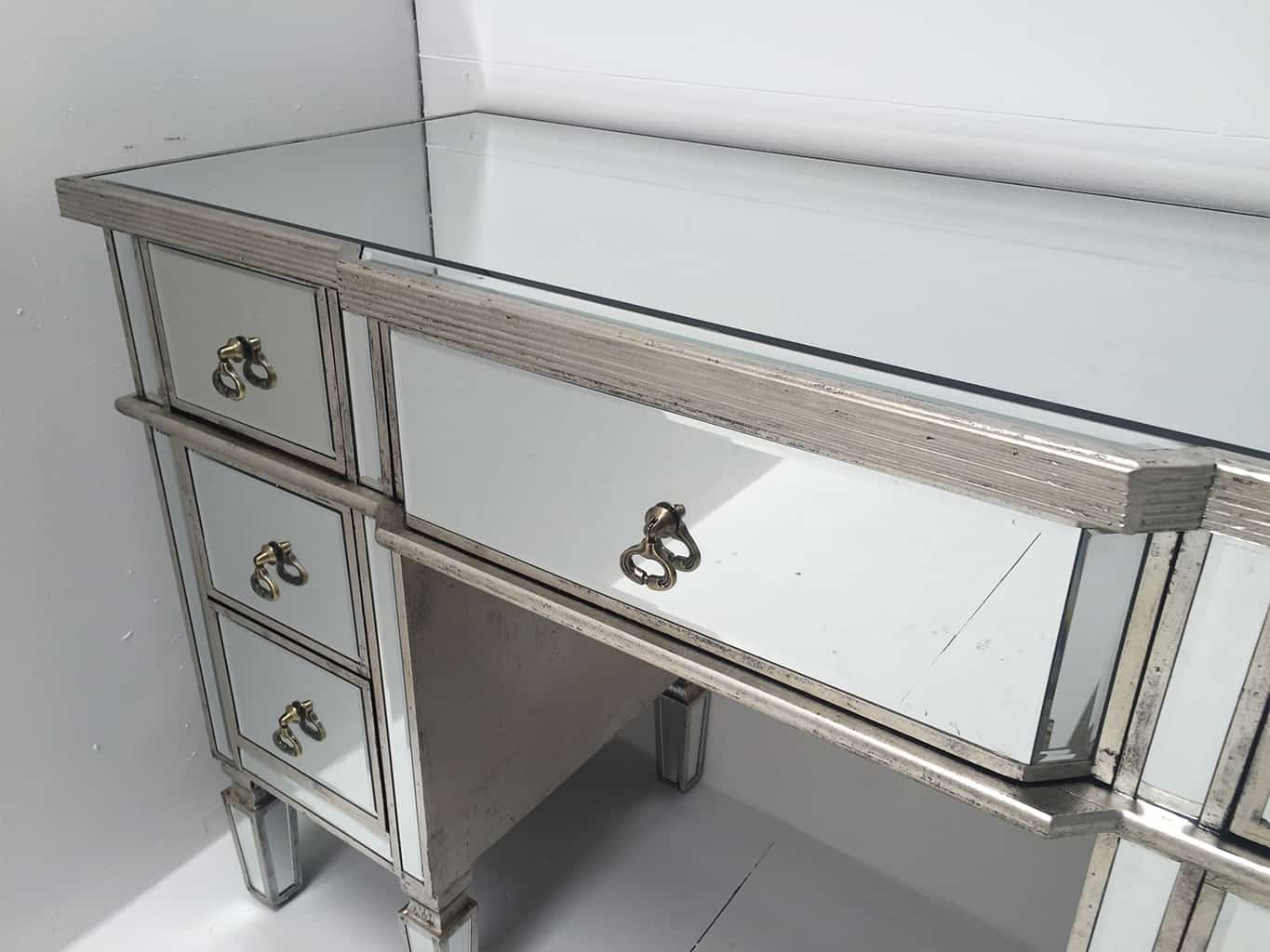Charleston Mirrored Dressing Table with 7 drawers, vintage drop ring pulls, bevelled with an antique silver wood edge.