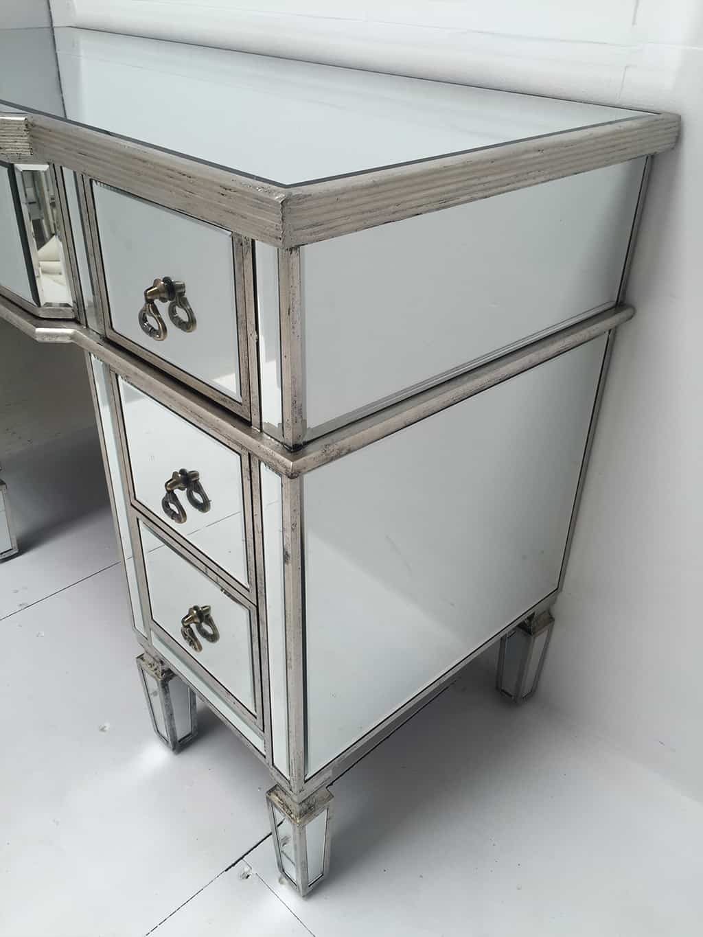 Mirrored Dressing Table with seven drawers, vintage drop ring pulls, bevelled with an antique silver wood edge.