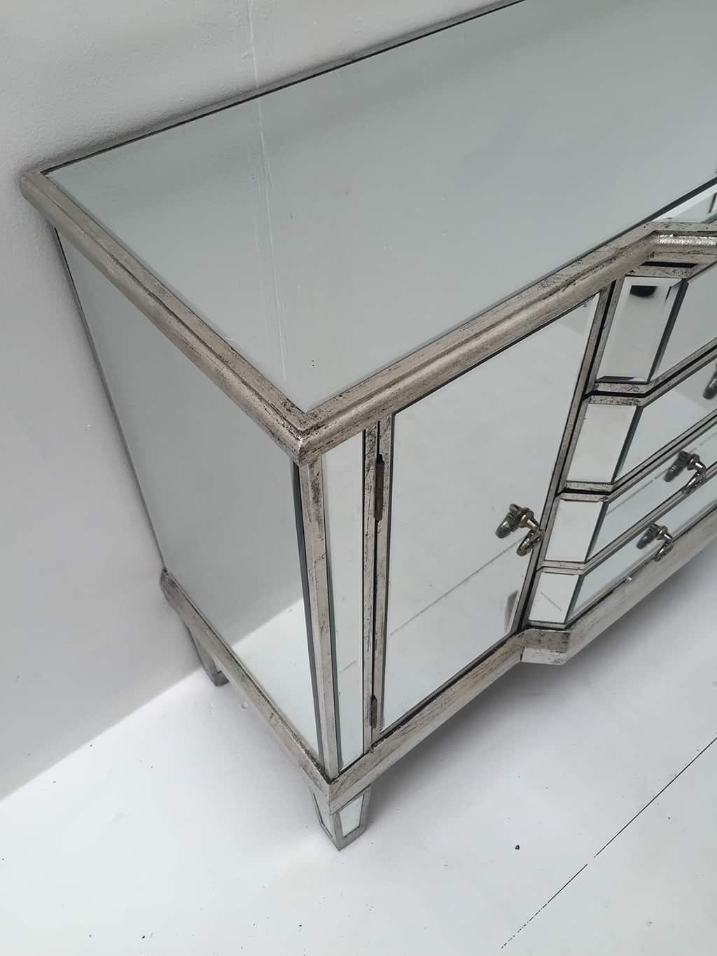 Mirrored Sideboard with four Drawers and two Cupboards, brass drop handles, wood and mirror, antiqued silver