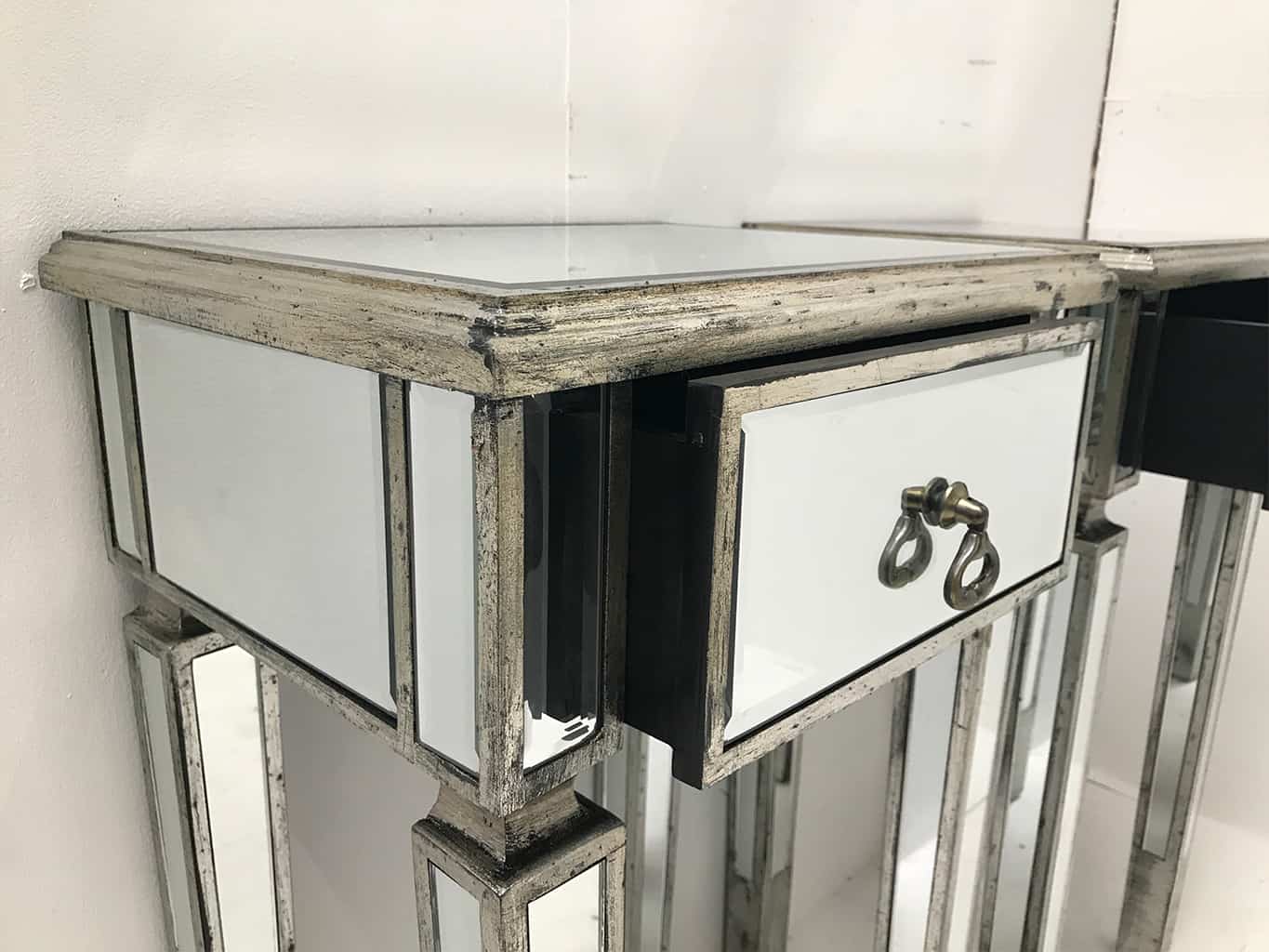 Mirrored Side Tables with wooden edging and antiqued slim silver finish from our stunning luxury Charleston collection. Brass drop handles, one drawer, wood and mirror, antique silver finish