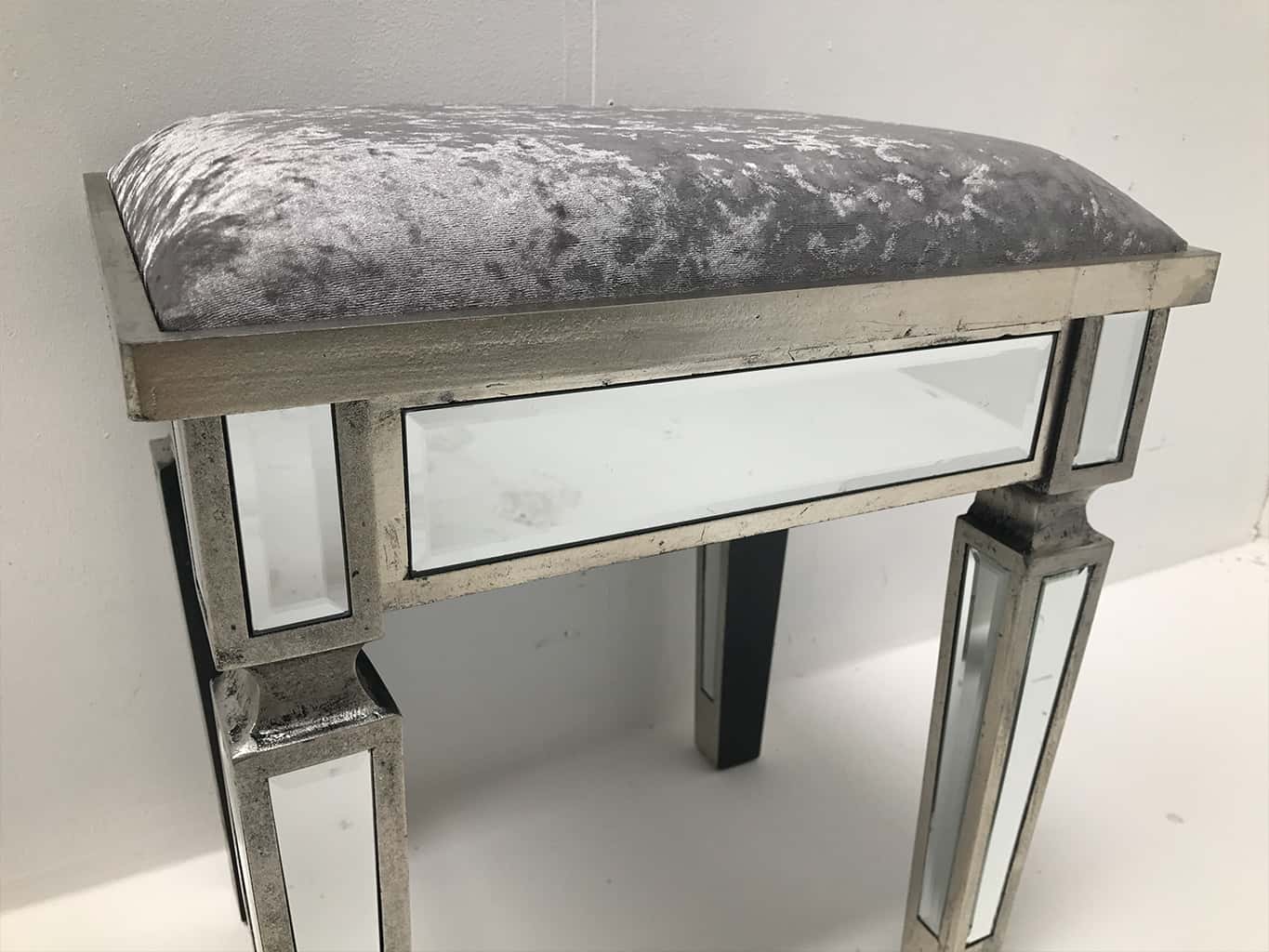 Stool in an antiqued silver finish with bevelled mirror panels upholstered with a sliver crushed velvet, feet high 35cm, wood and mirror and cloth, antiqued silver