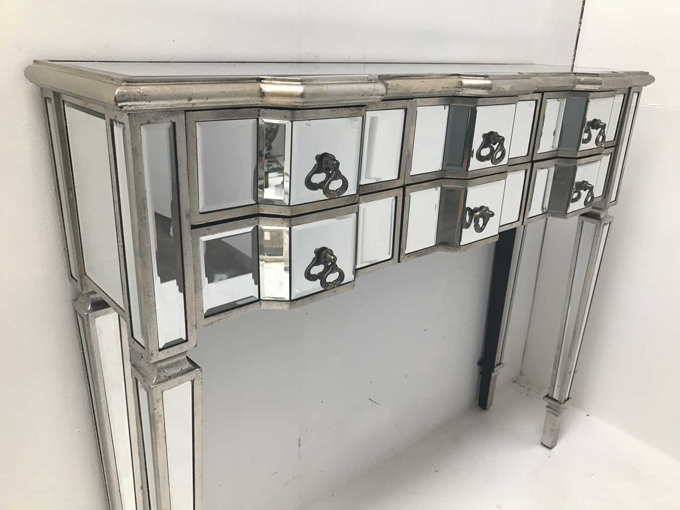 Charleston mirrored console table, six drawers, wood and mirror, antiqued silver, brass drop handles