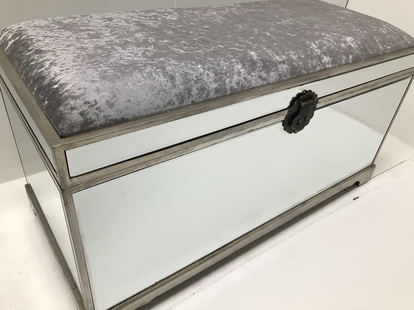 Mirrored Trunk with all bevelled mirror panels, the lift up lid is upholstered in a silver crushed velvet material, so can be used as a seat when closed, wood and mirror and cloth, antiqued silver finish.