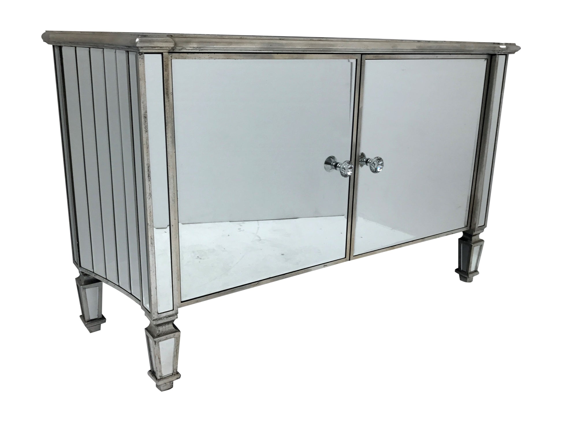 Marbella mirrored sideboard with 2 cupboard doors. All mirrored panels are bevelled and the ends are curved, crystal knobs, wood and mirror, antiqued silver