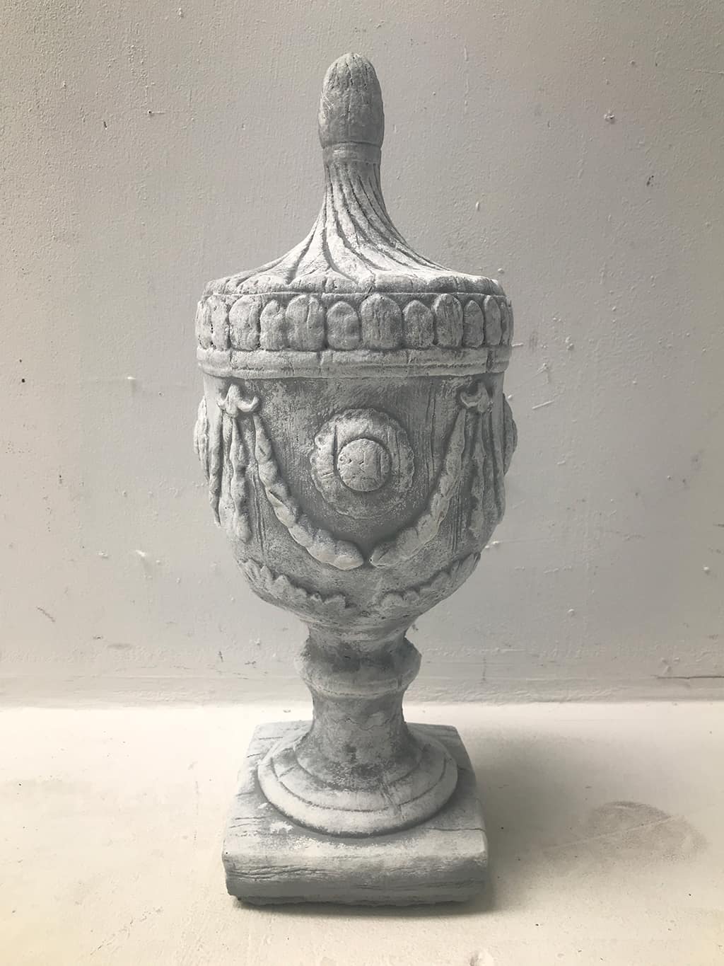 Decorative Finial in a distressed antique white finish reconstituted stone antique white